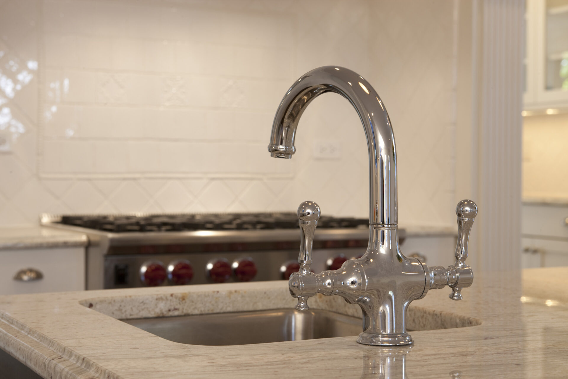 Stainless faucet in kitchen space