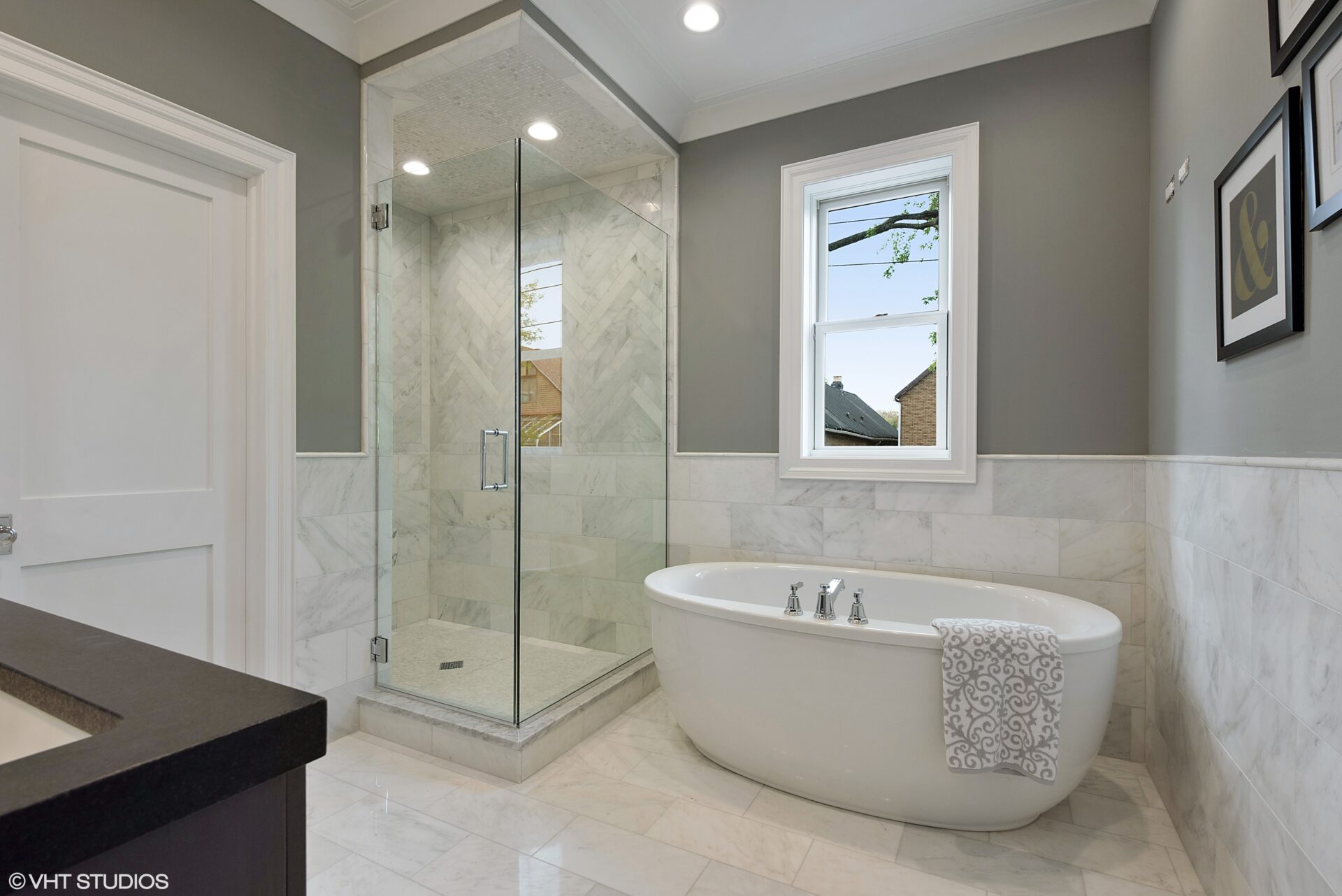 modern elegant bath space with shower and tub