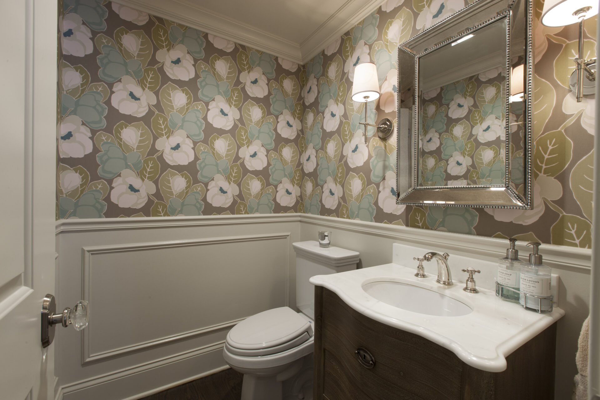 Bathroom with accent floral wallpaper