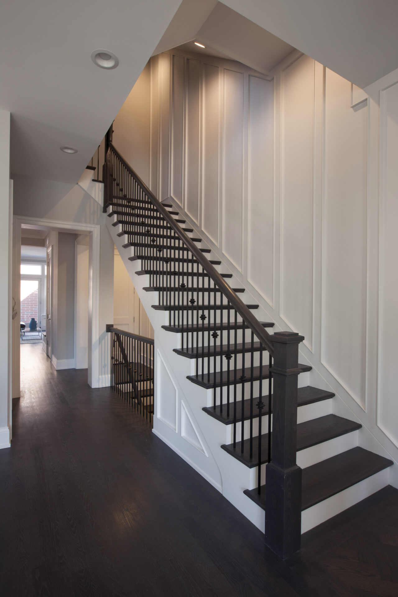 Staircase with white walls