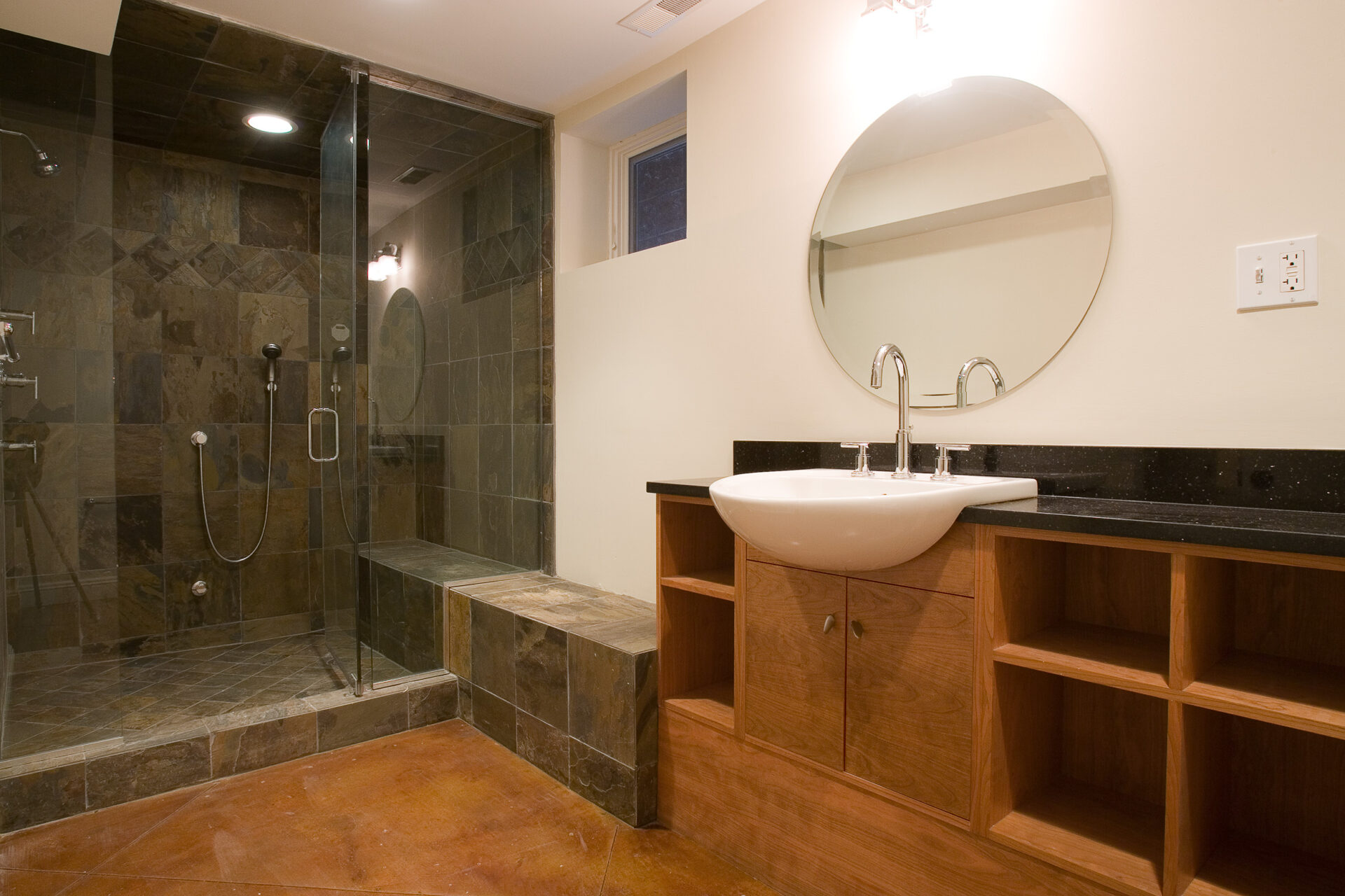 Modern bathroom with shower area, mirror, sink